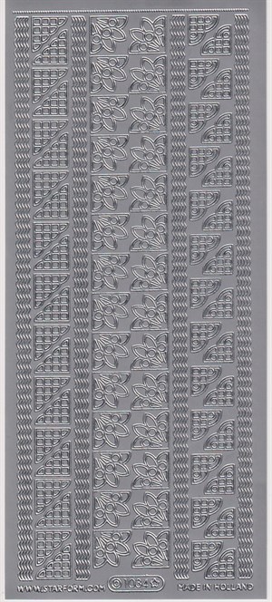 1034 - Hjørner, kanter, stickers, sølv.